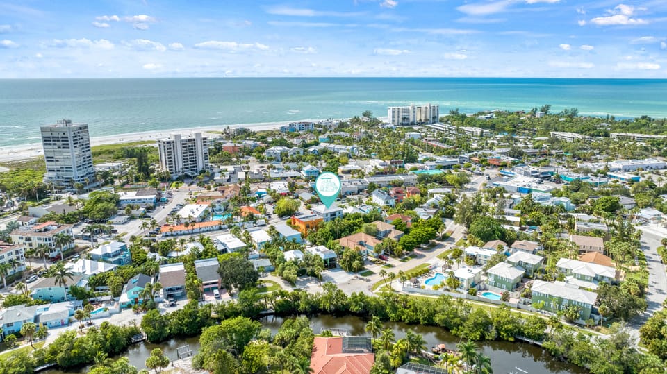 Aerial view marking Casa Mahalo—see how close you are to the white sands of Siesta Key Beach.