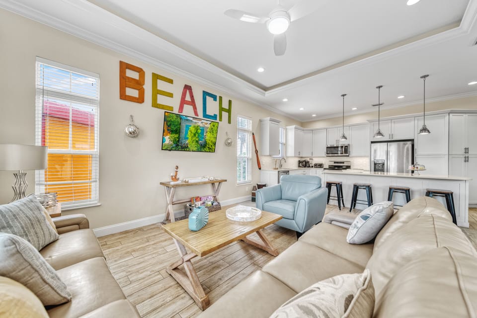 From the living room, enjoy the view back to your sleek kitchen—open flow that keeps everyone connected.