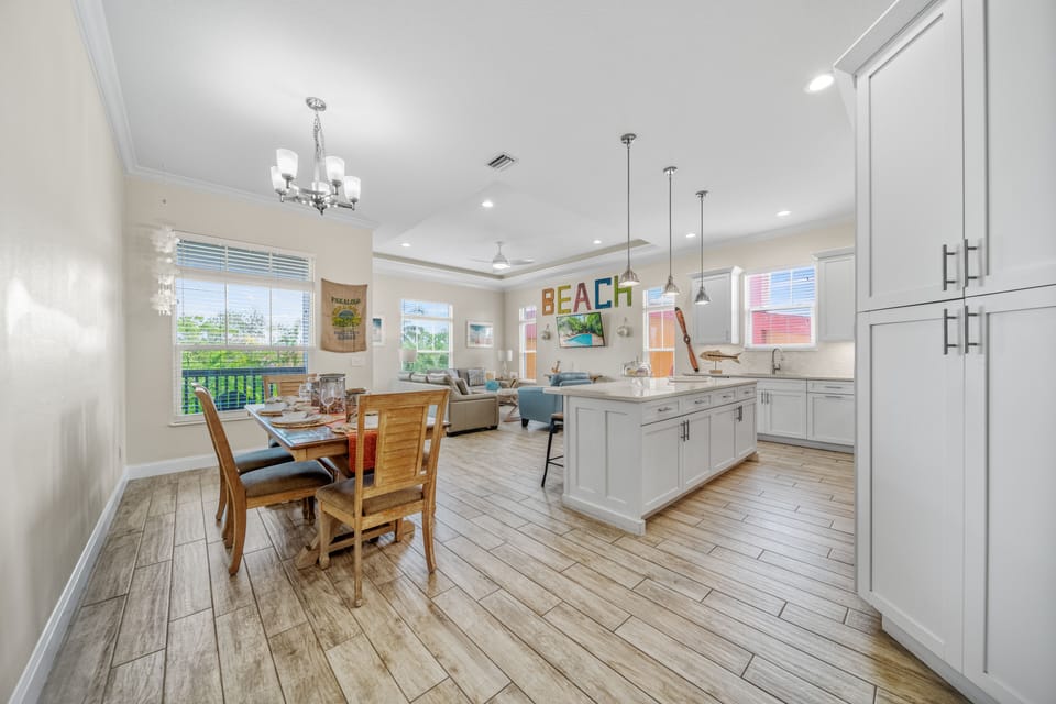 Bright, open-concept living—where cozy gatherings and breezy island vibes blend seamlessly.