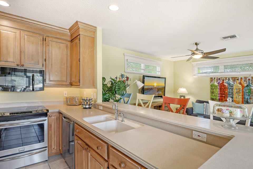 Open kitchen design lets you cook while still enjoying the action.