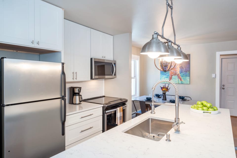 This fully equipped kitchen is fantastic for family meals, and is a great spot to gather at the end of an epic mountain day.