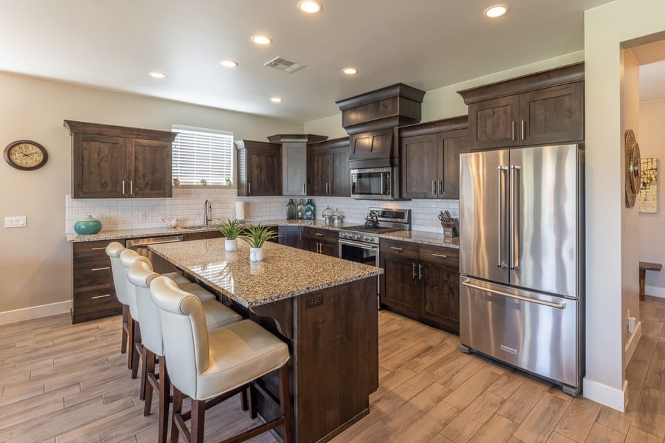 Kitchen Island - The Kitchen Island comfortably seats 4 adults and creates a great space for serving and preparing meals.