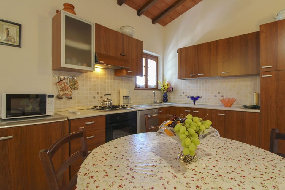 Kitchen, Furniture, Countertop, Interior Design, Wood, Flooring, Kitchen Appliance, Cabinetry, Floor, Lighting