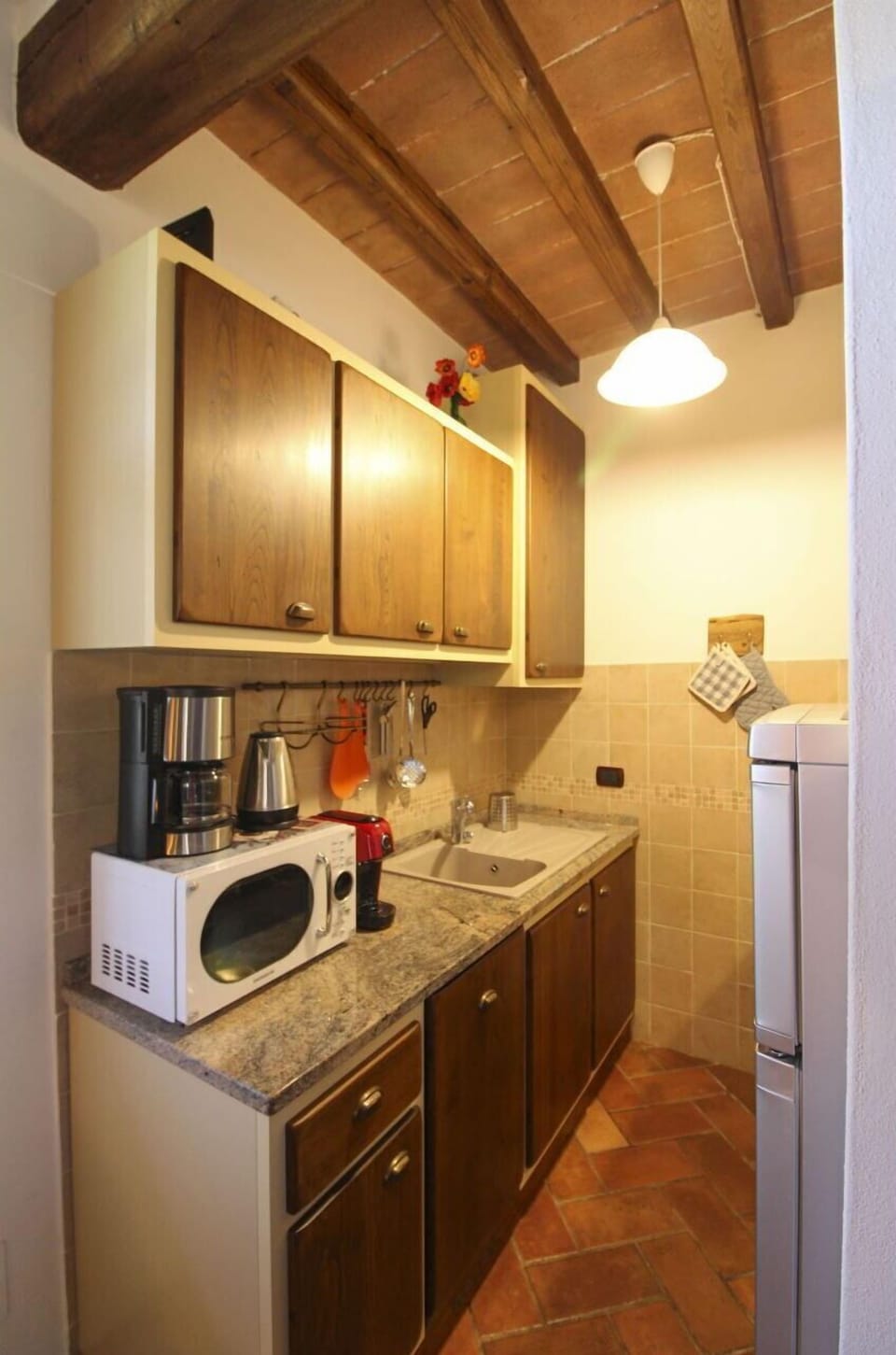 Countertop, Interior Design, Kitchen, Kitchen Appliance, Flooring, Major Appliance, Cabinetry, Wood, Furniture, Ceiling