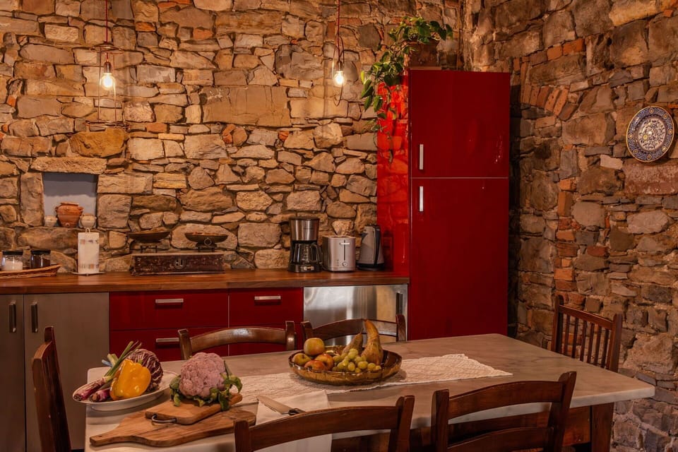 Wall, Furniture, Interior Design, Flooring, Kitchen, Stone Wall, Room, Cabinetry, Ceiling, Countertop