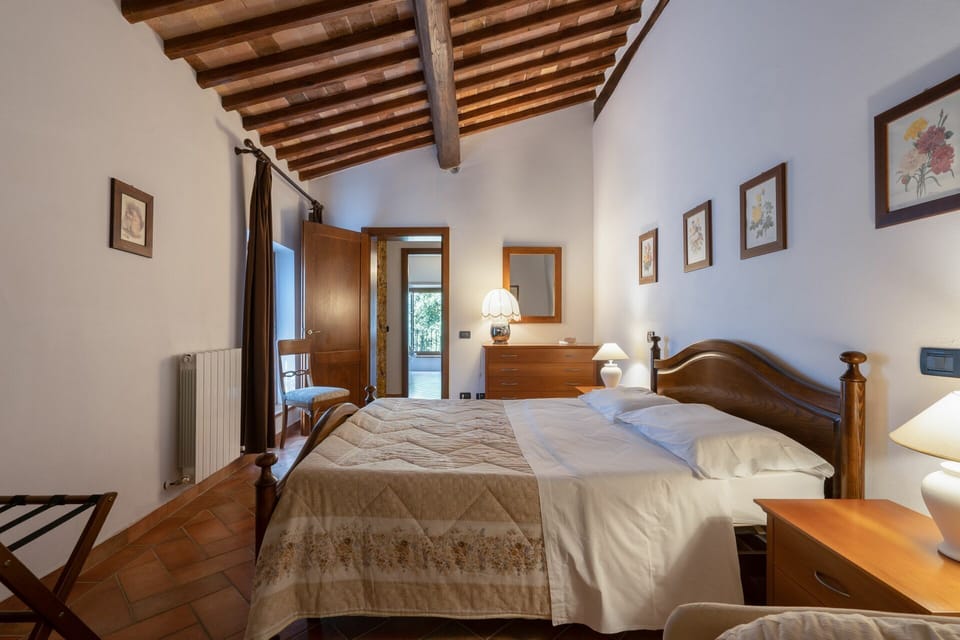 rocche-di-valiano-chianti-castelnuovo-berardenga-multiproprietà-geranio-bedroom