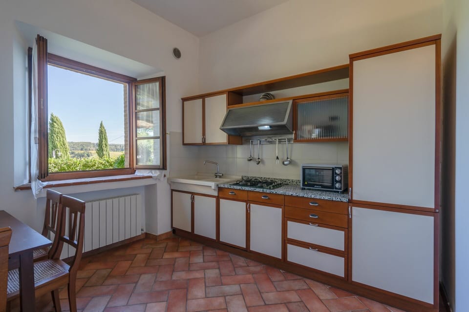 rocche-di-valiano-chianti-castelnuovo-berardenga-multiproprietà-geranio-kitchen