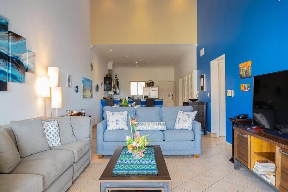 View of living area, dining area and kitchen