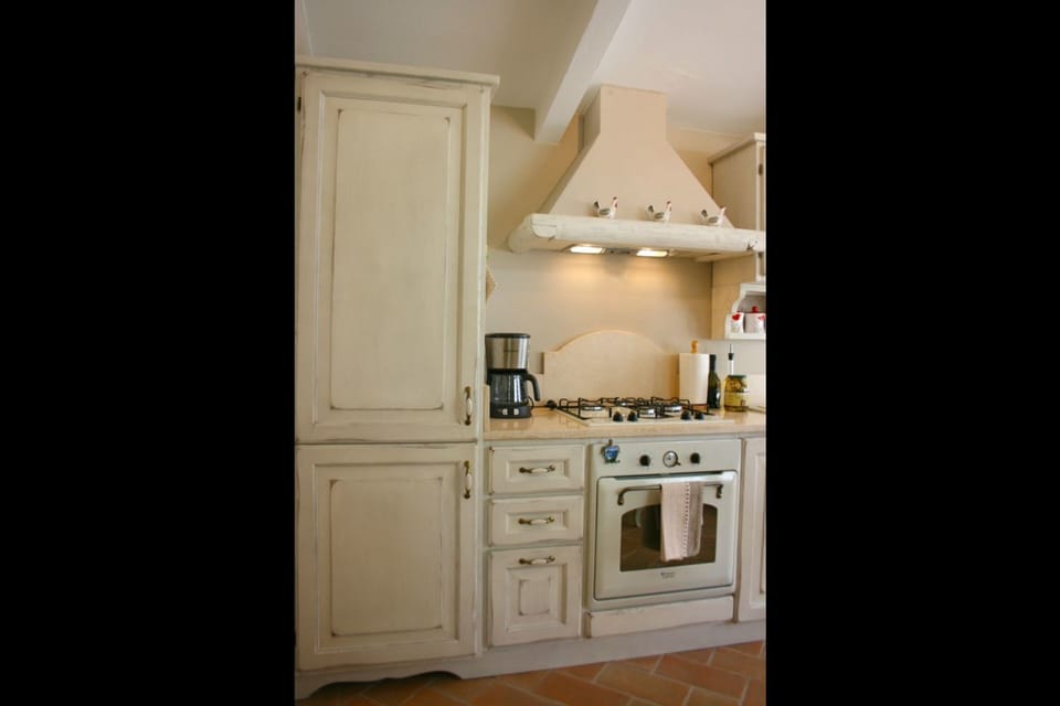 Cabinetry, Room, Furniture, Property, Kitchen, Countertop, Interior Design, Floor, Lighting, House