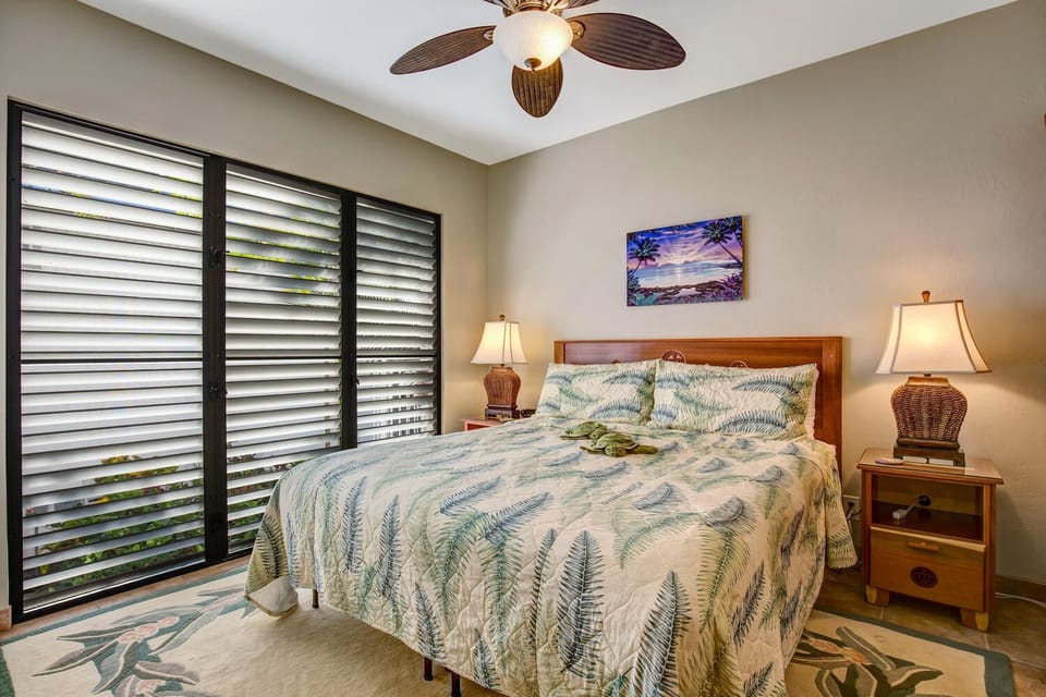 Large bed and nightstands in bedroom 2.