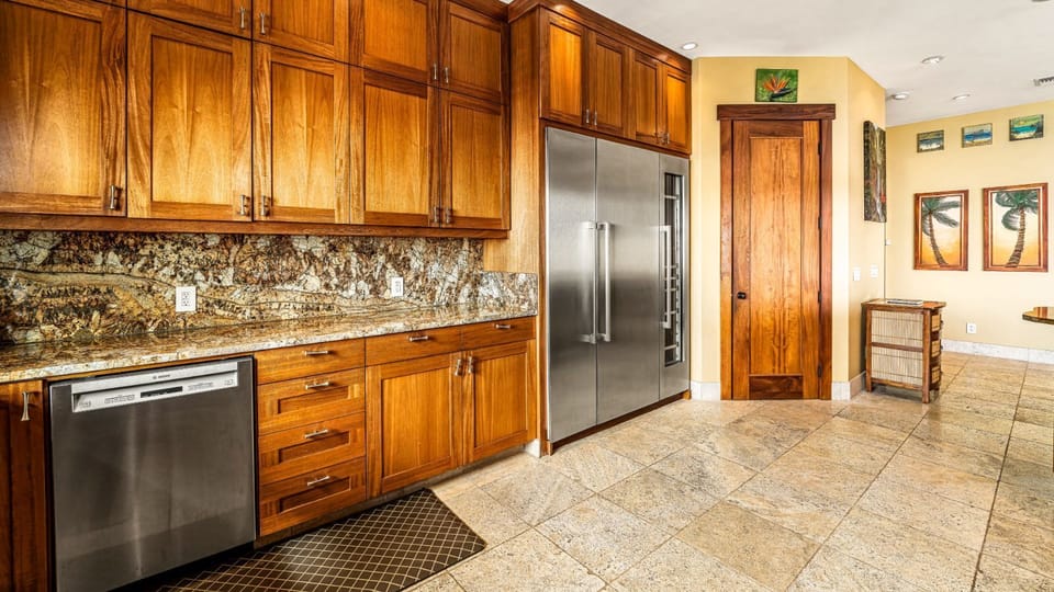 Spacious Kitchen with stainless steel appliances - please note - the fridge has changed to a standard french door.