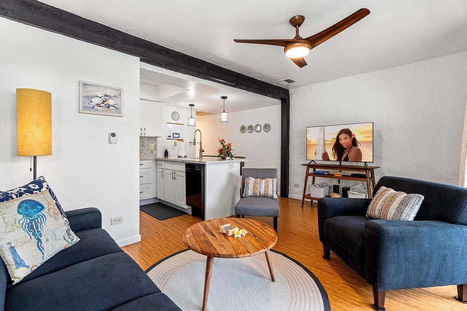 Living area with chair and TV.