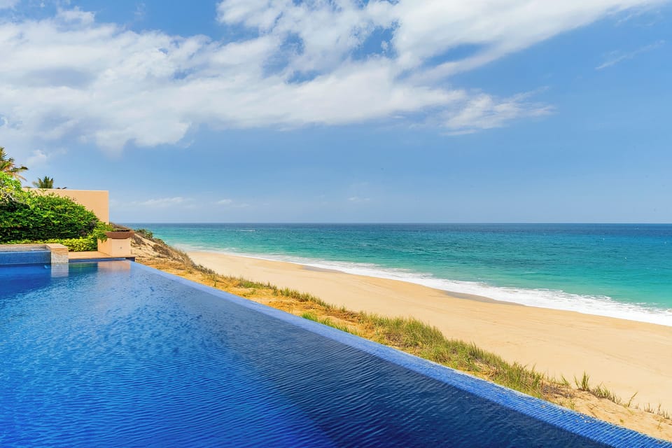 Infinity pool with breathtaking beach views