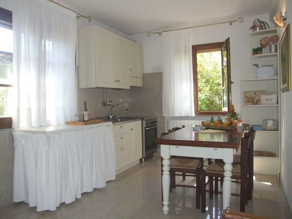 Furniture, Flooring, Interior Design, Wood, Floor, Cabinetry, Lighting, Home, Countertop, Room