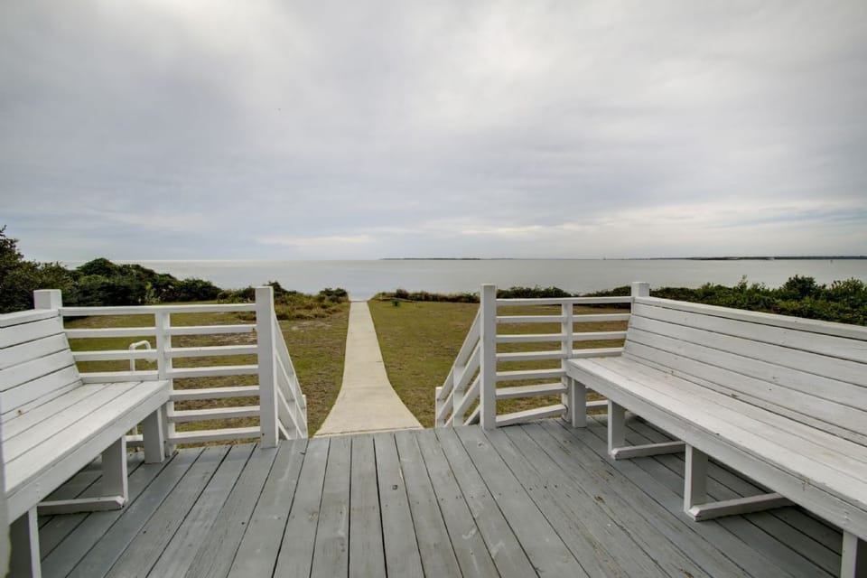 Open deck with beach path.