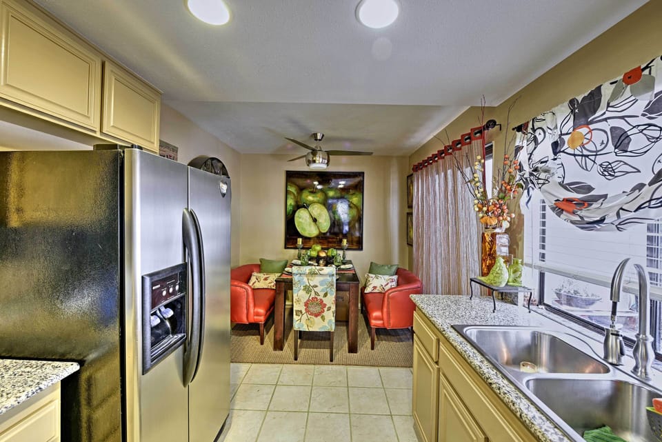 There is an additional glass sliding door next to the kitchen for patio access.