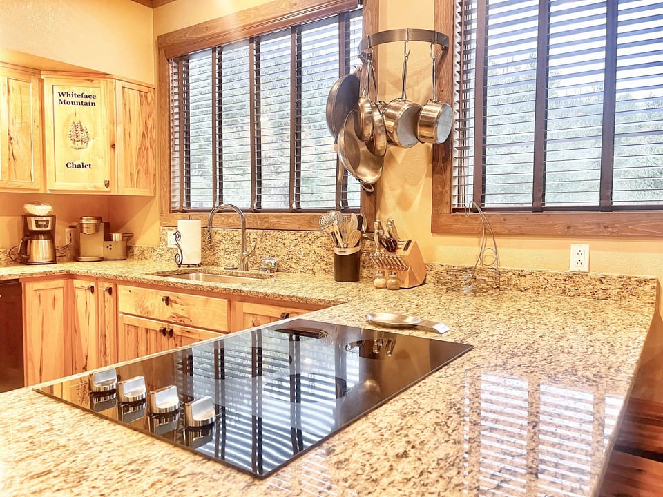 Spacious, beautiful kitchen is fully equipped to make meals at home.
