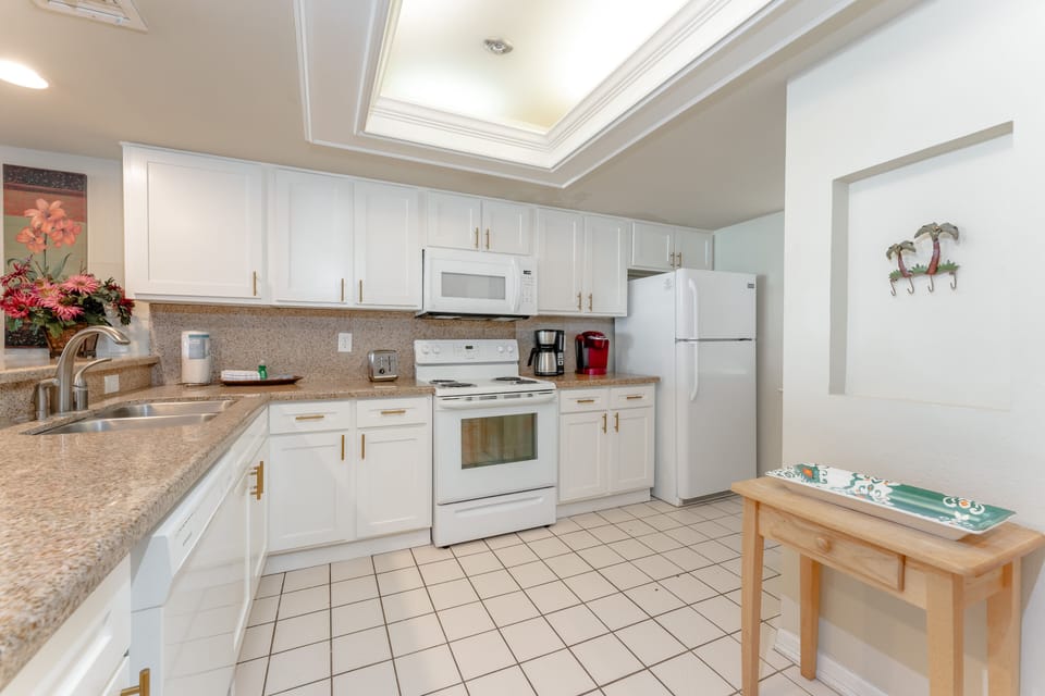 With ample counter space, a convenient breakfast bar, and a wide array of essential appliances and gadgets, cooking a meal has never been this enjoyable.