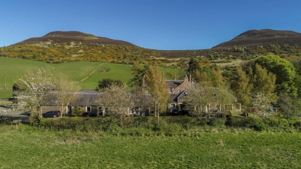 Cottage setting with the backdrop of the Eildon Hills