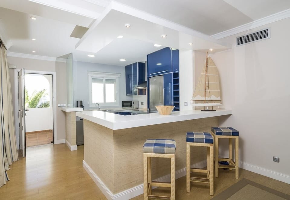 Located in Estepona, this 2-bedroom open plan beachfront apartment can accommodate 4 people.
This 80m2 charming and calm family friendly apartment is located right next to the beach making this the perfect accommodation for those looking for a beach