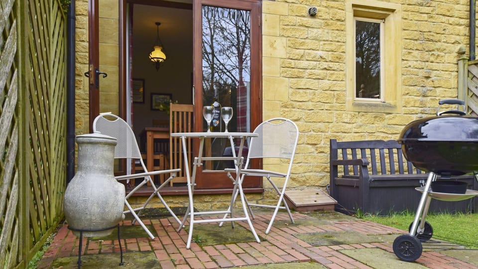 Patio area with BBQ and seating, Stepping Stones, Bolthole Retreats