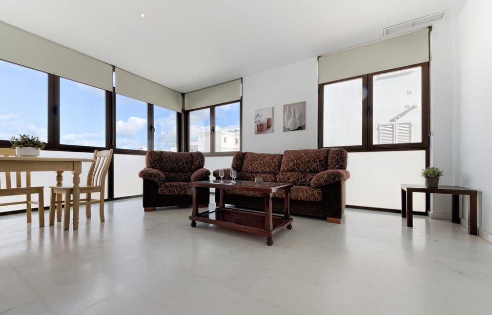 Sofas and table of Mercurio Apartment 1living room  in Villas Flamenco Rentals in Conil