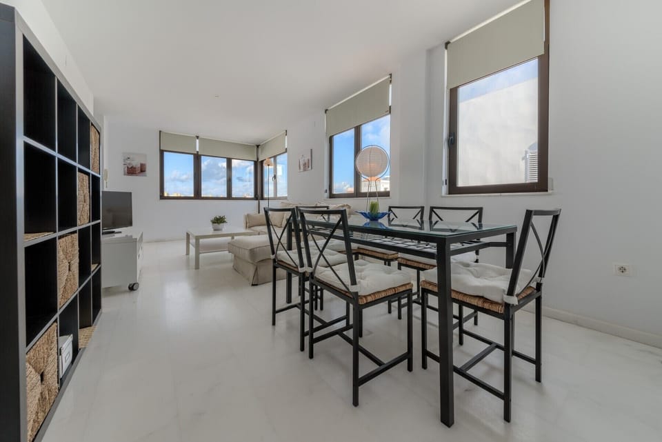 Table and chairs of Mercurio Apartment 2  living room in Villas Flamenco Rentals in Conil