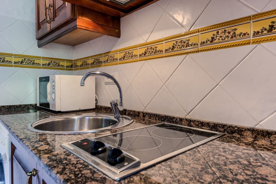 Kitchen sink of the apartments on the top floor at Hacienda Roche Viejo in Conil