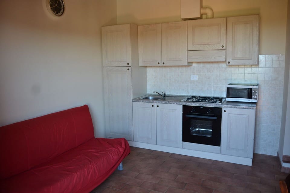 Room, Property, Furniture, Kitchen, Floor, Cabinetry, Building, Countertop, Major Appliance, House