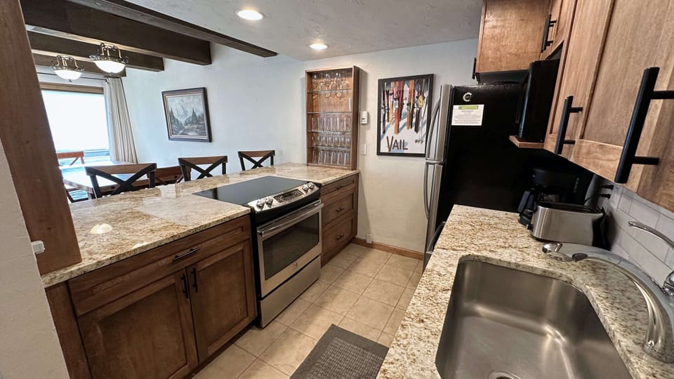 Kitchen with electric appliances.