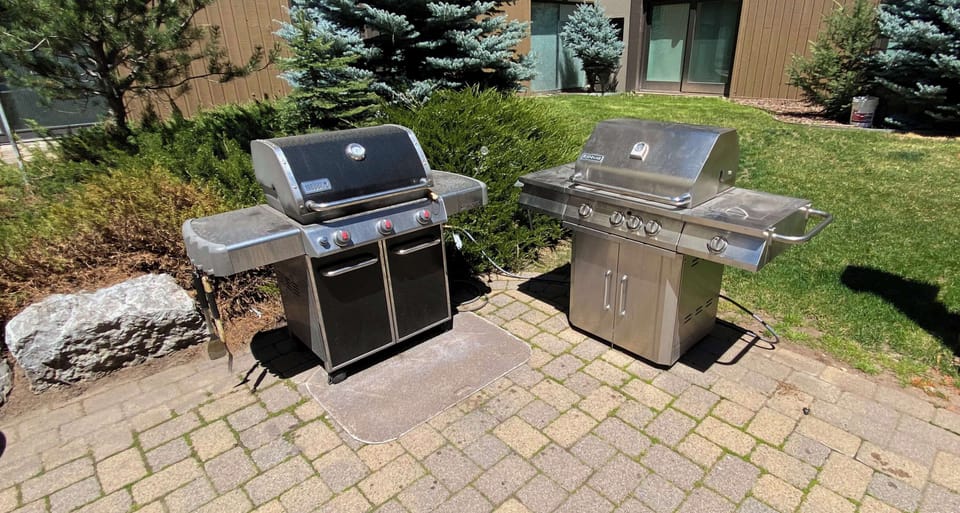 Gas grills for guest use on the pool deck.
