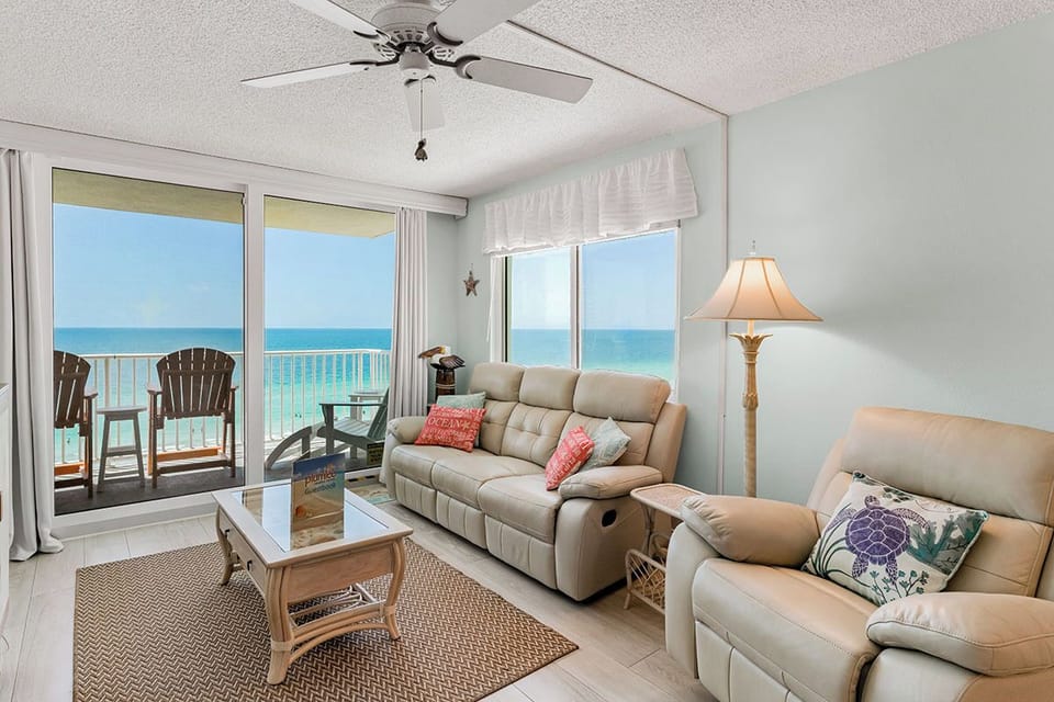 Unwind in your coastal haven with panoramic ocean views, comfortable seating, and soothing sea breezes from your private balcony.