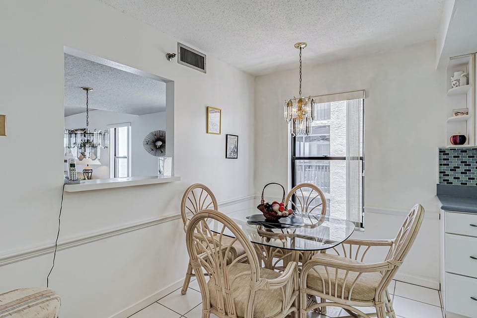 Your bright dining area features elegant furnishings and an open layout perfect for memorable meals together.
