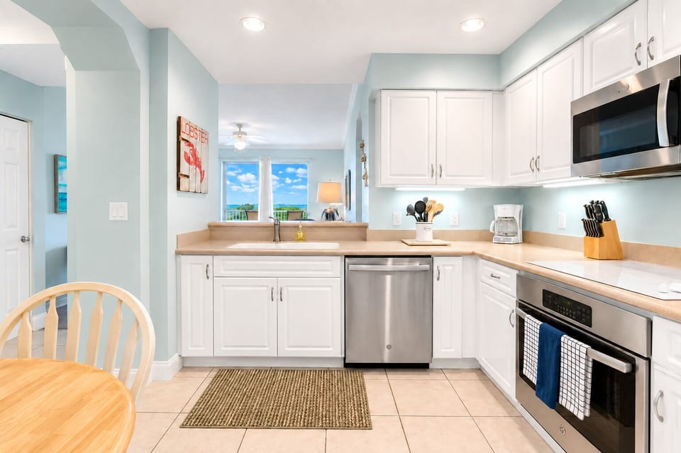 Kitchen overlooks the living room and river