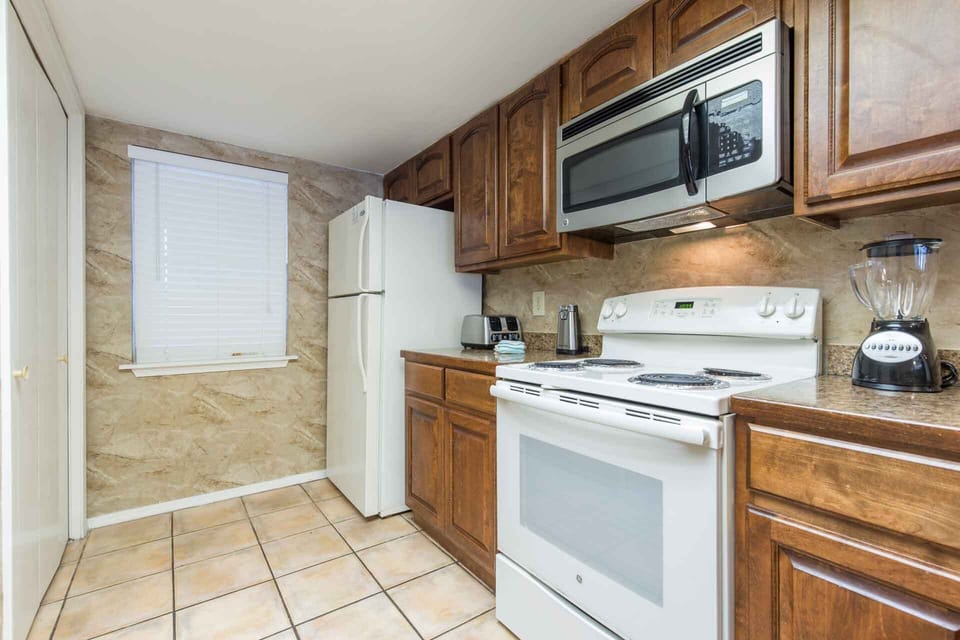 The kitchen is fully stocked with everything you might need.