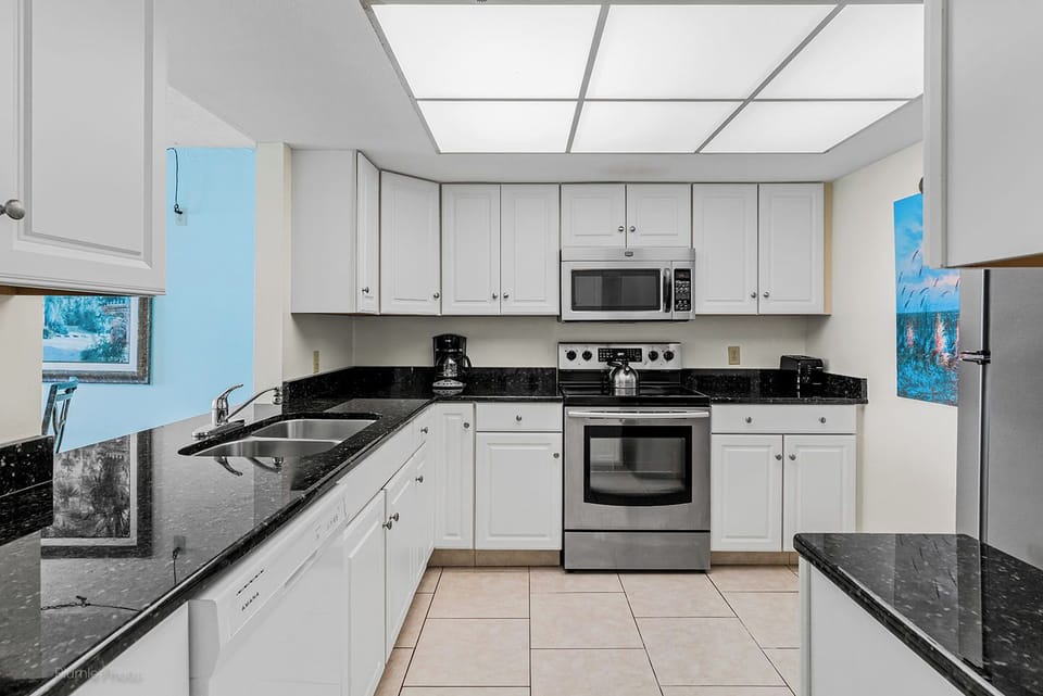 Enjoy preparing your meals in this light and bright Kitchen