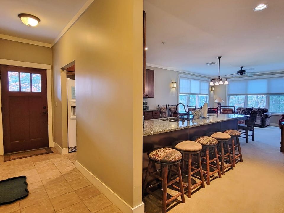 View of kitchen entry, kitchen/living area