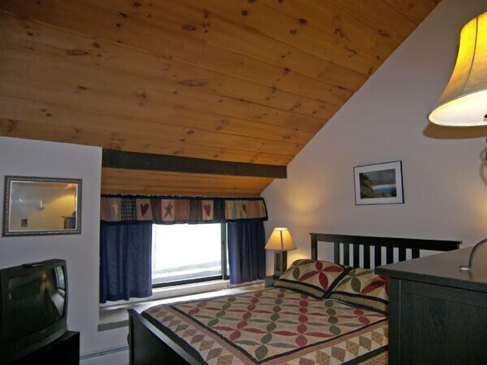 Bedroom - Entry level bedroom with queen bed.