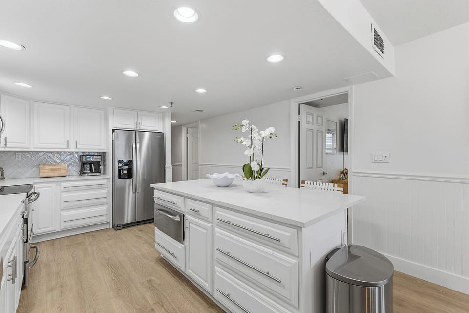 Kitchen + Quartz Counters + Stainless Appliances