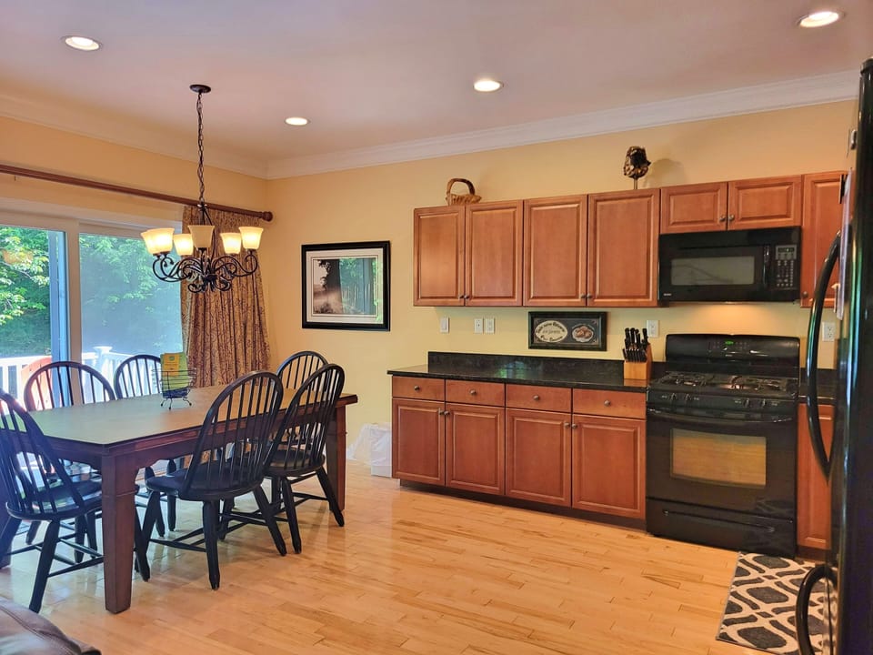Kitchen and dining view with deck slider