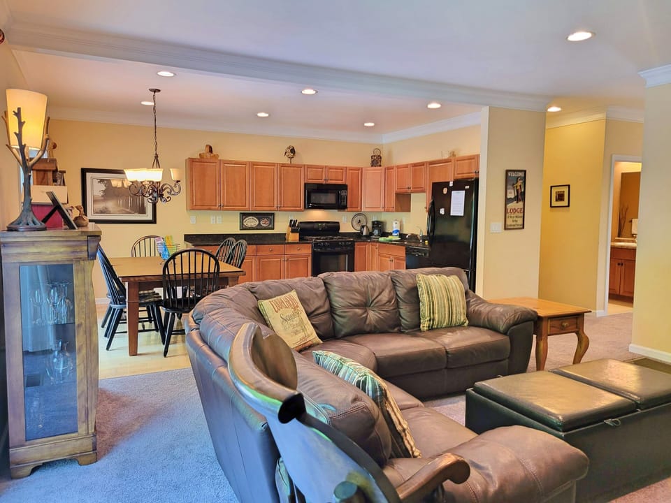 Livingroom towards kitchen with half bath in background