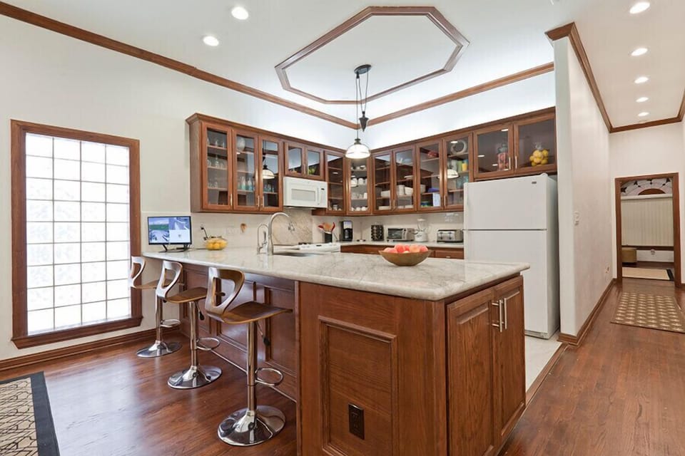 Cooking for the fam will feel like a vacation in itself. You'll have a view of the other living areas and plenty of natural light. 