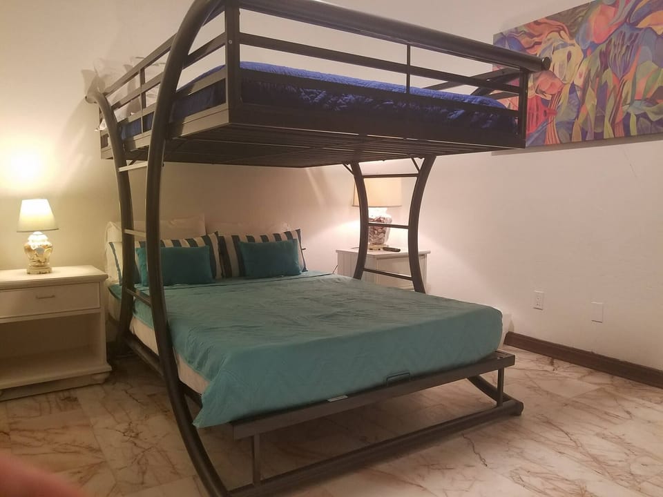We are happy to ensure enough room for your whole crew this vacation! We've installed queen-size bunk beds so you can make the best use of your home.