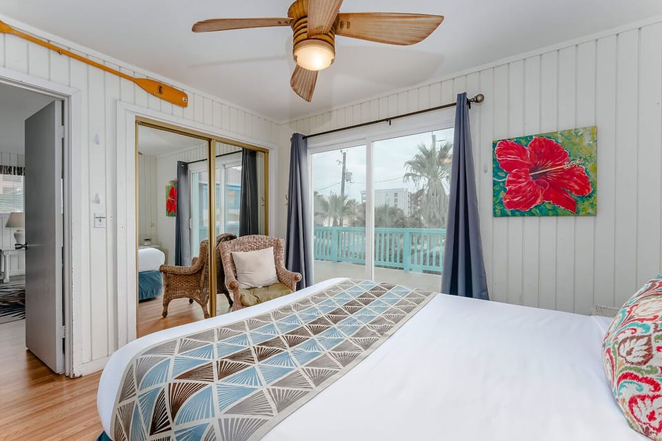 The upstairs primary bedroom has direct access to the back patio where the view of the pool will is unmatched!