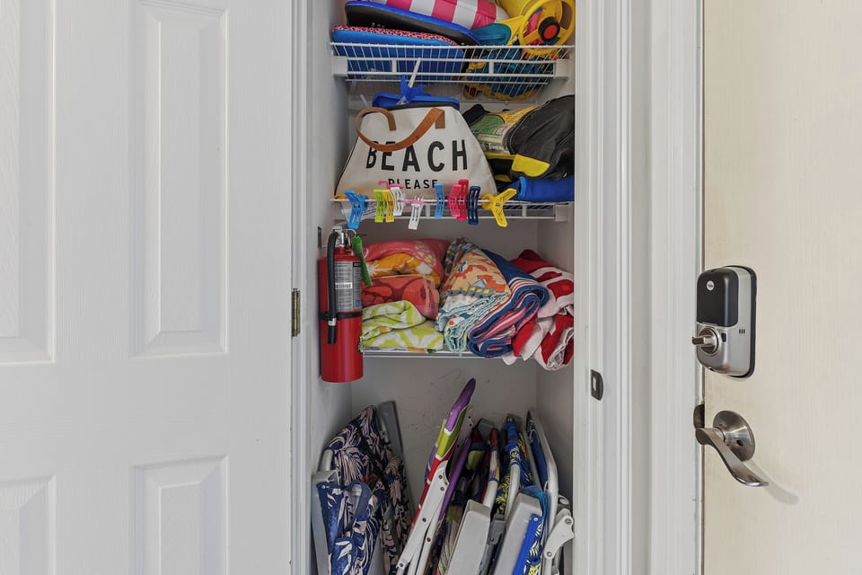 Closet with tons of beach supplies