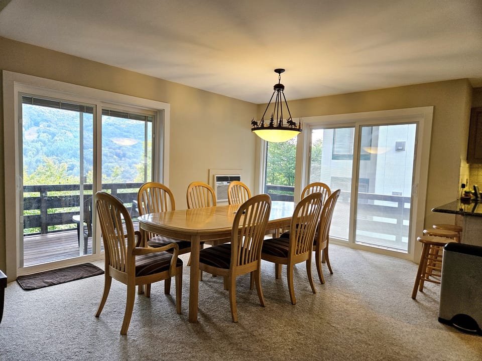 Dining area with AC and 2 sliders