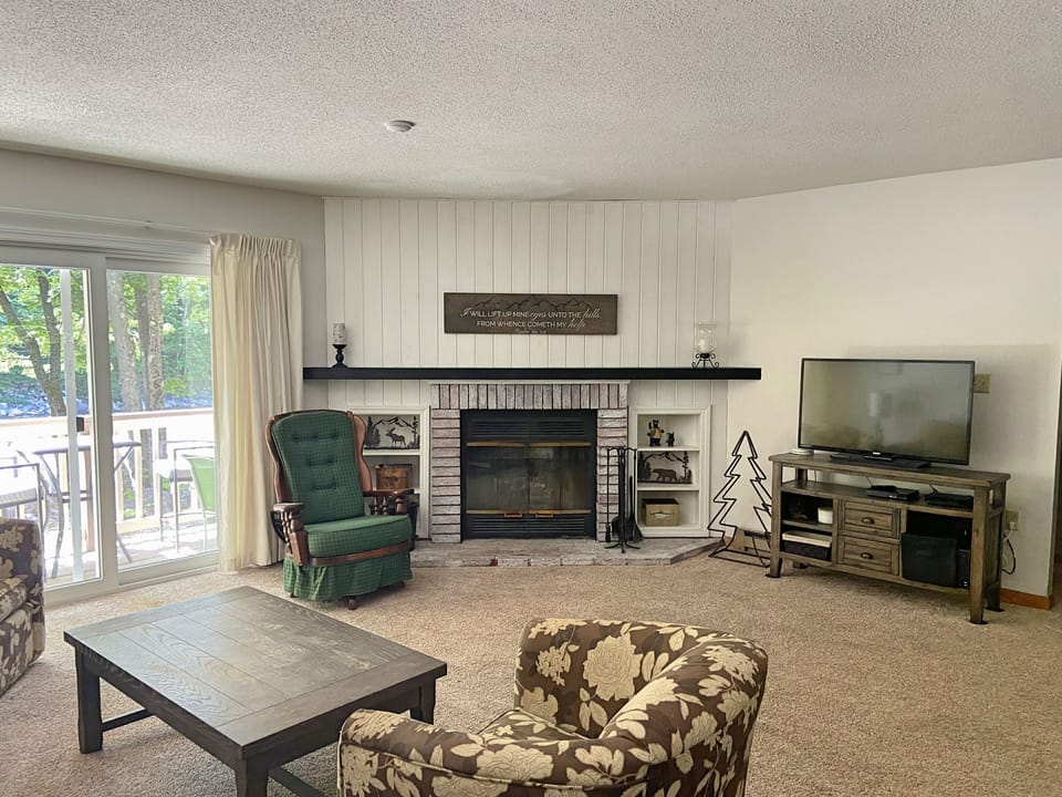 Fireplace, TV and deck slider
