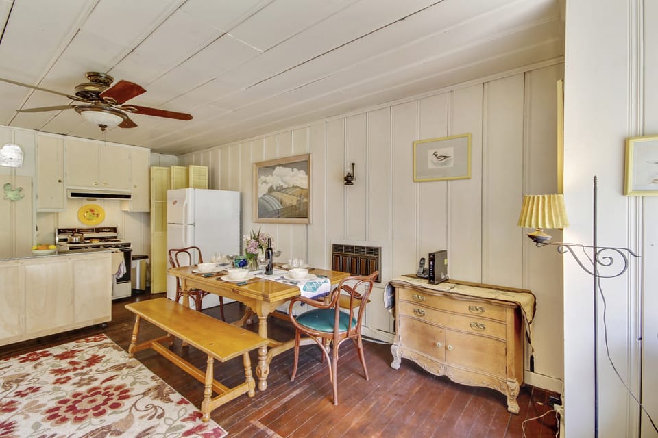 Comfortable dining for 4 open to the kitchen.