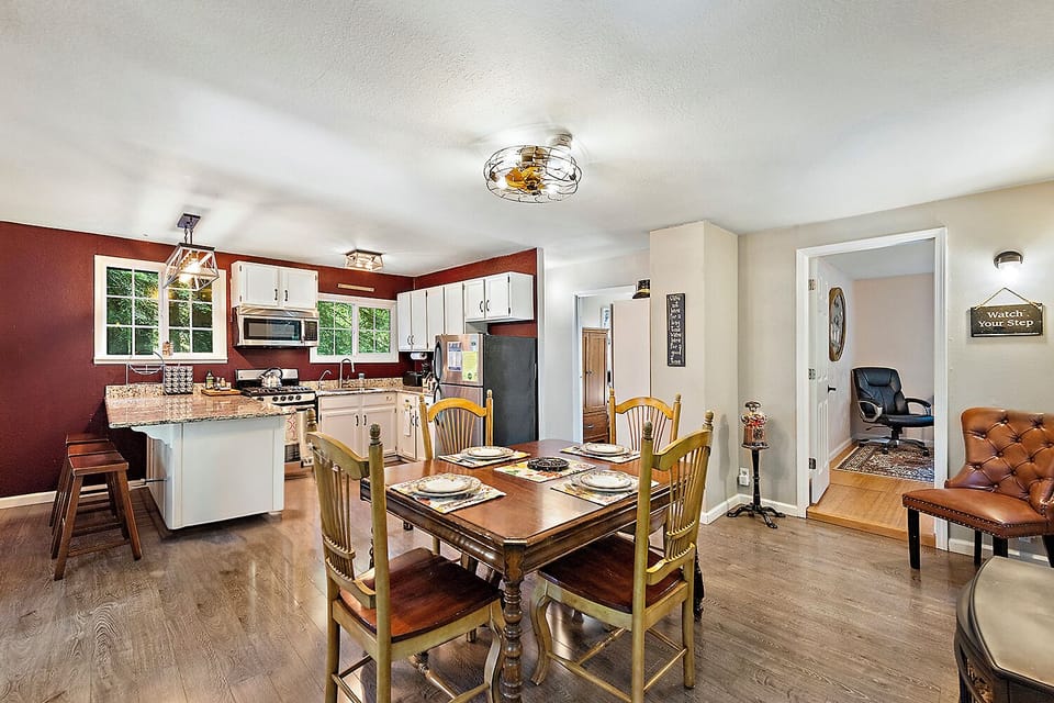 Have a meal and great conversation with the open kitchen and dining area.