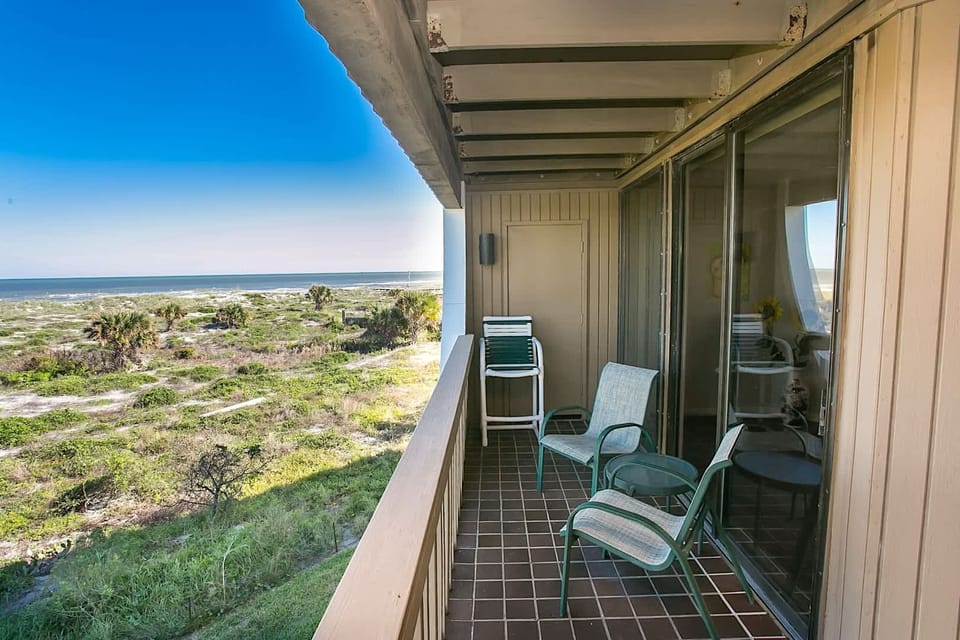 - Private balcony furnished with comfortable seating for outdoor relaxation
- Overlooks the dunes and ocean, offering endless coastal scenery to enjoy
- Perfect spot for morning coffee, quiet reading, or sunset watching together